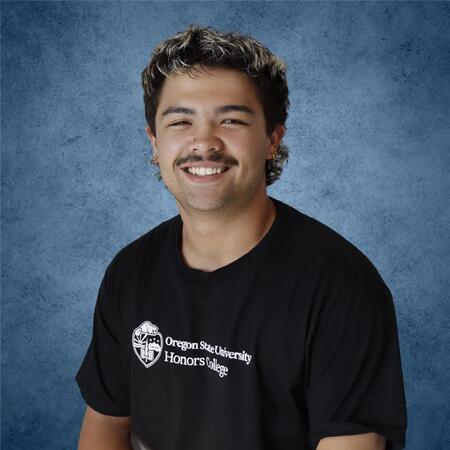 Theo Jones smiling for a portrait