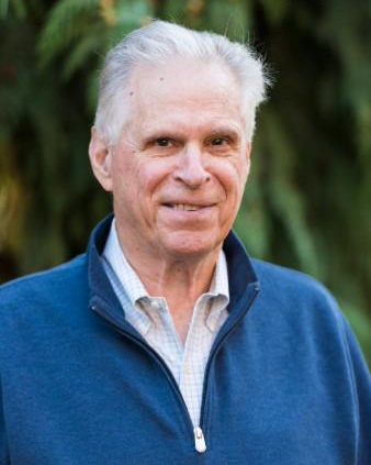 Paul smiling for a headshot