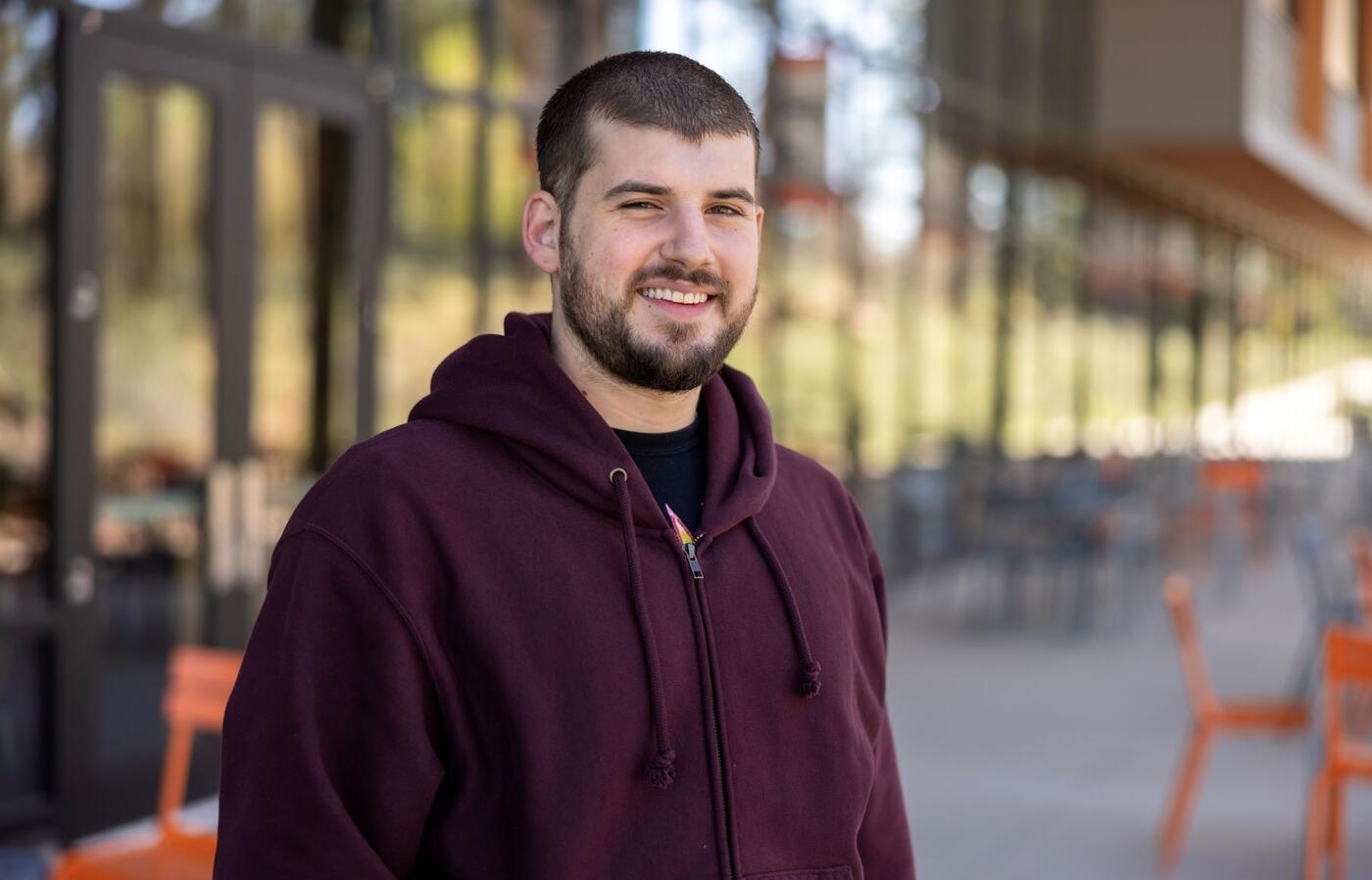 Steven smiling for a portrait at OSU-Cascades