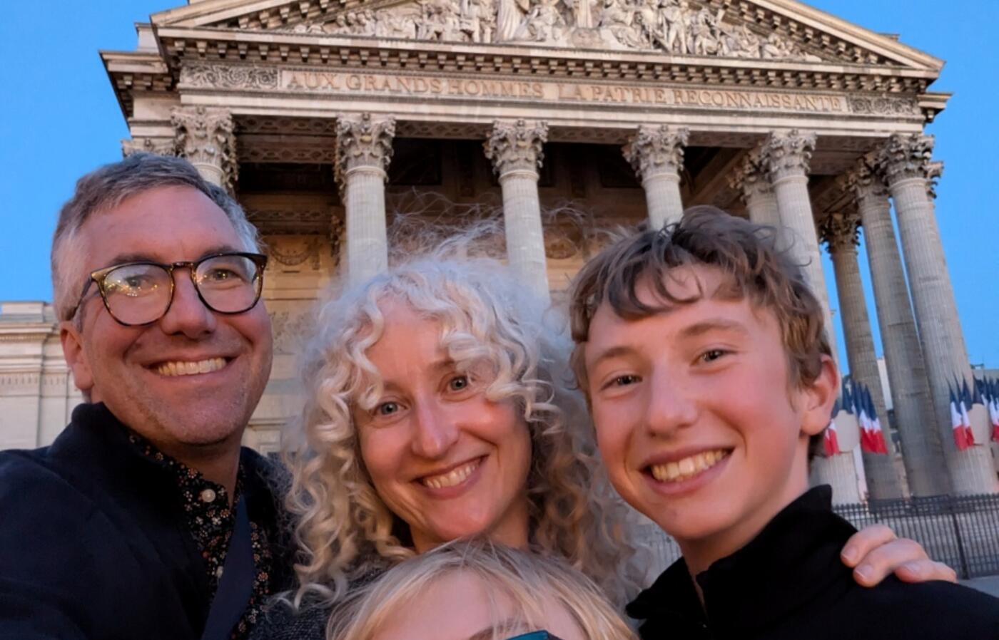 Kevin with his wife and two sons in France.