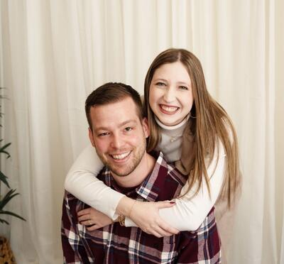 Katelyn smiling with her husband.