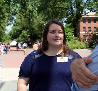 Brittany Sundberg speaking with someone.