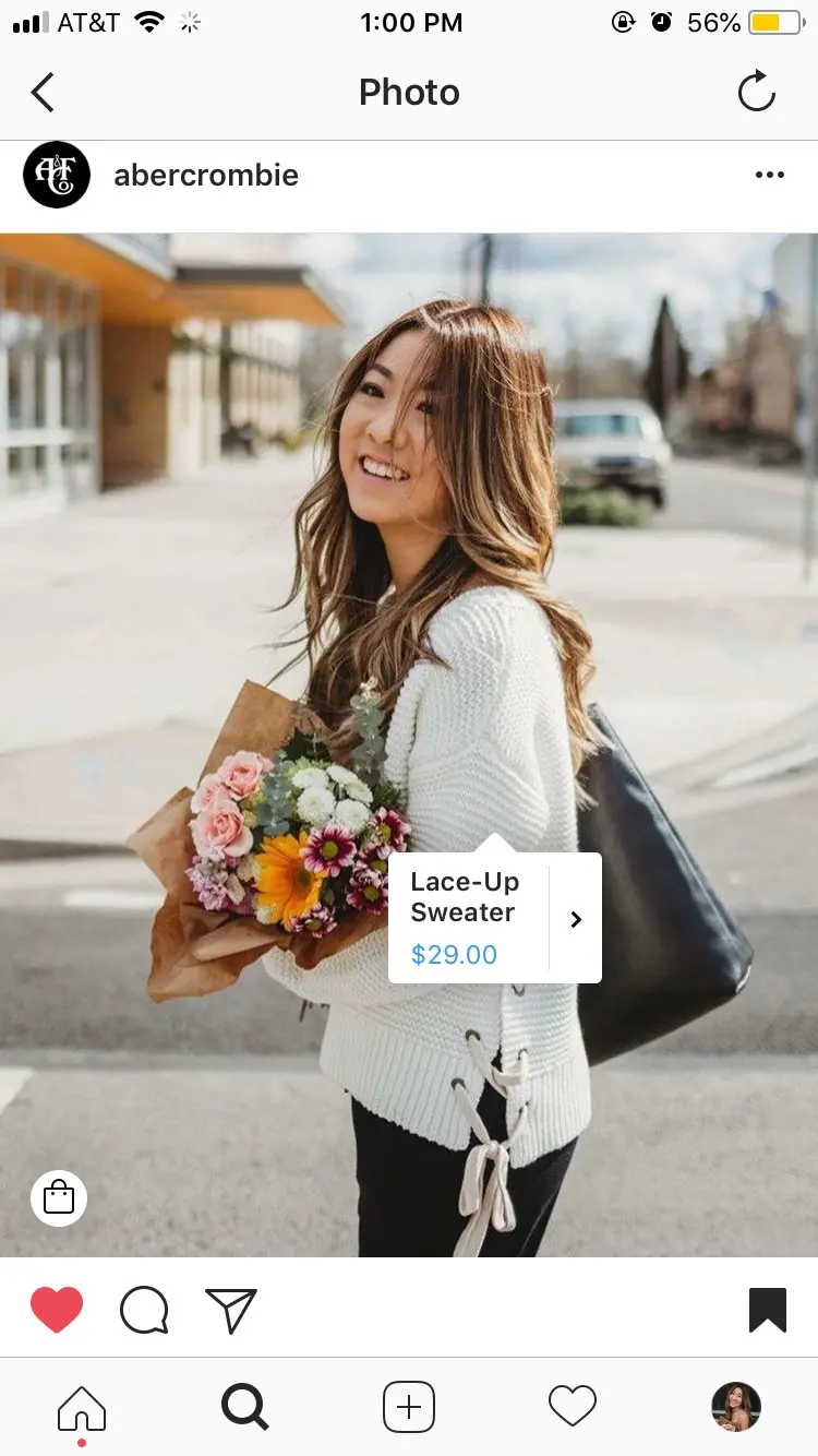 Instagram screenshot of a post where Marissa is holding a boquet