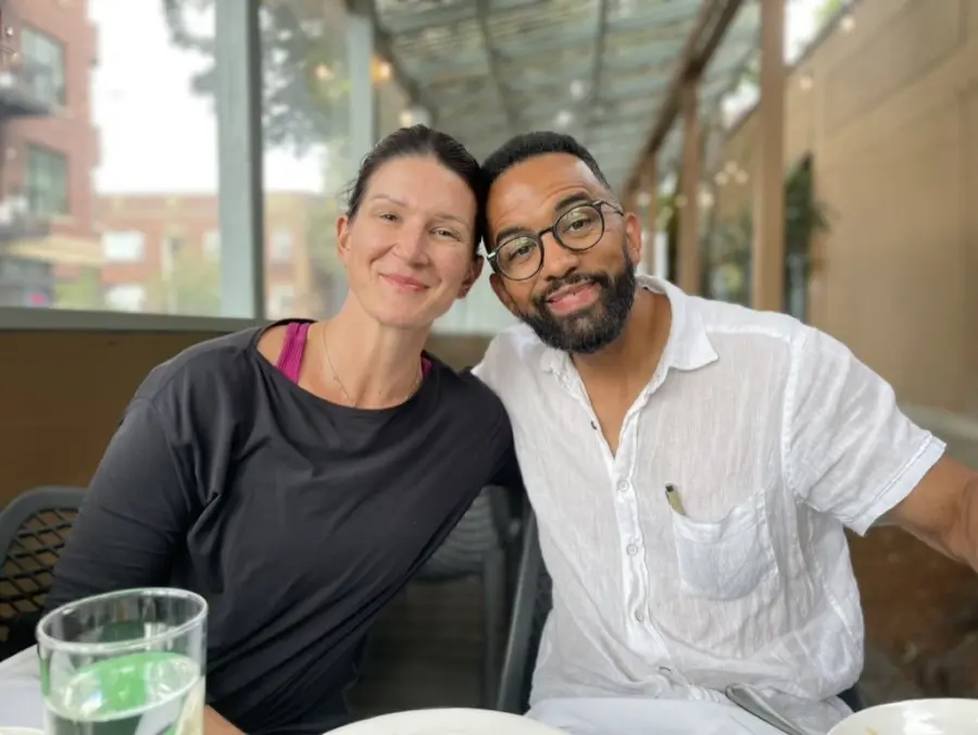 James and his wife smiling.