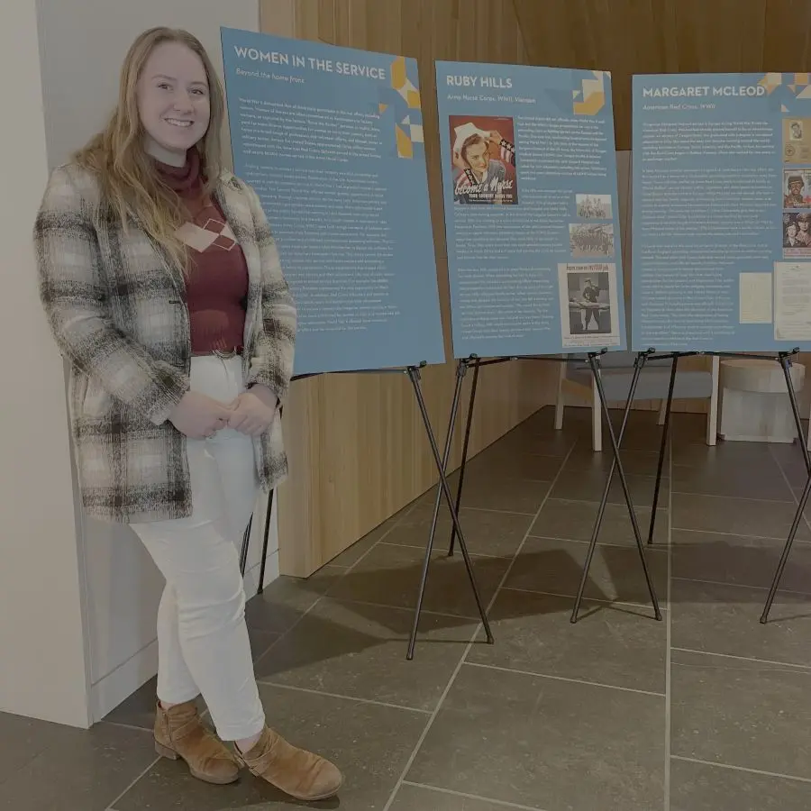 Grace visiting her exhibit on Oregonian women who served abroad in World War II at the Corvallis Museum.