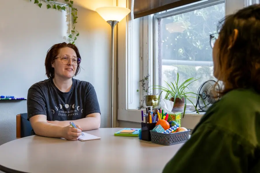 Coach at the Academic Success Center working with a student.