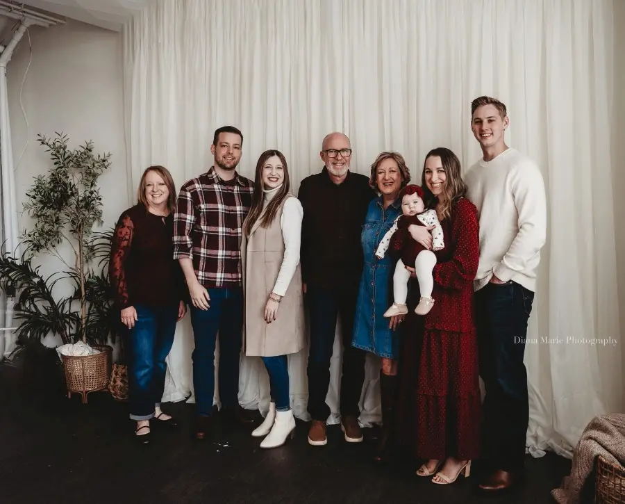 Katelyn posing with her family.