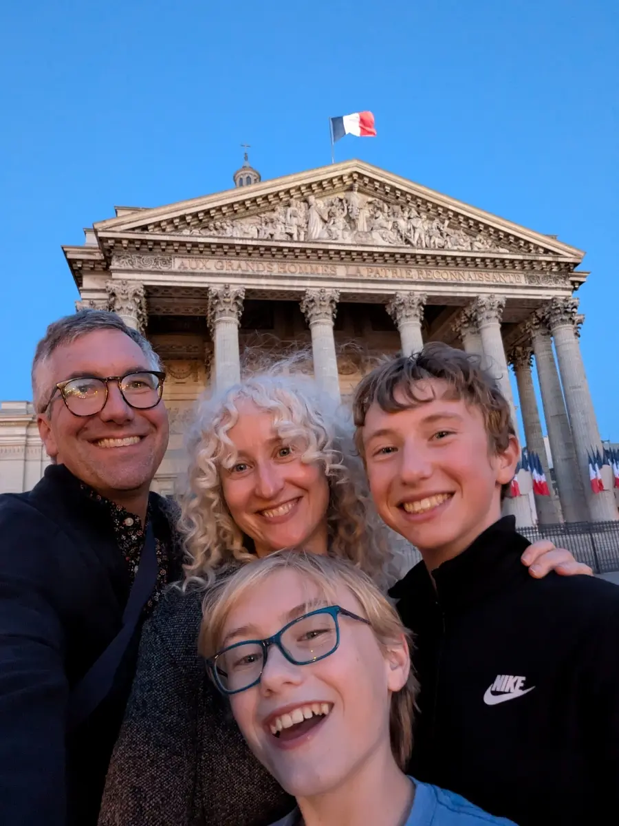 Kevin with his wife and two sons in France.