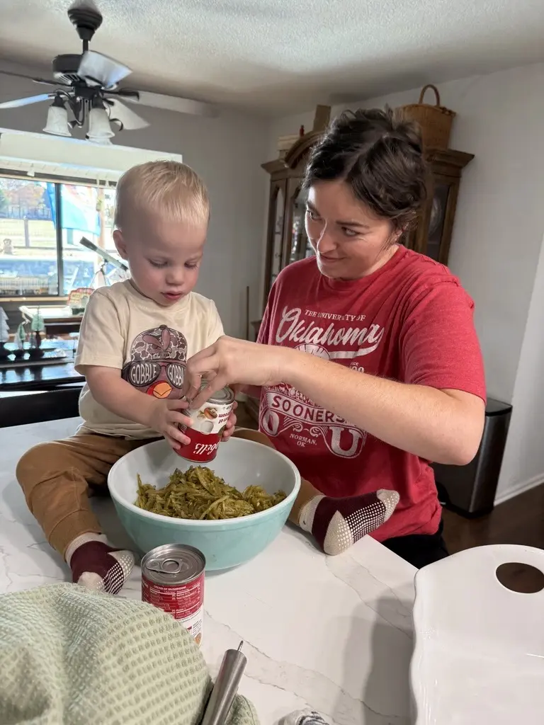 Kara baking with her nephew Major.