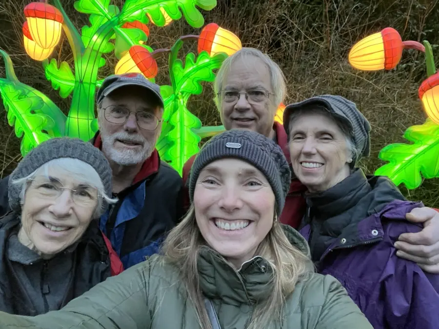 Diana Marvel taking a selfie with family members.