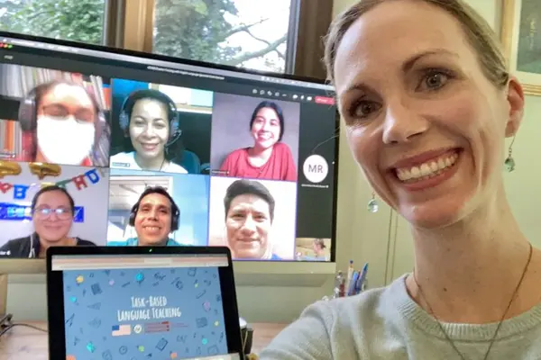Kathleen Burrows on a zoom call with teachers
