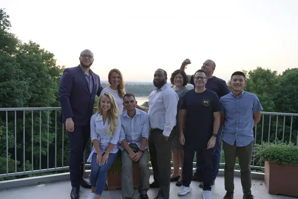 Kari and her team at Boeing Leadership Conference standing on a balcony