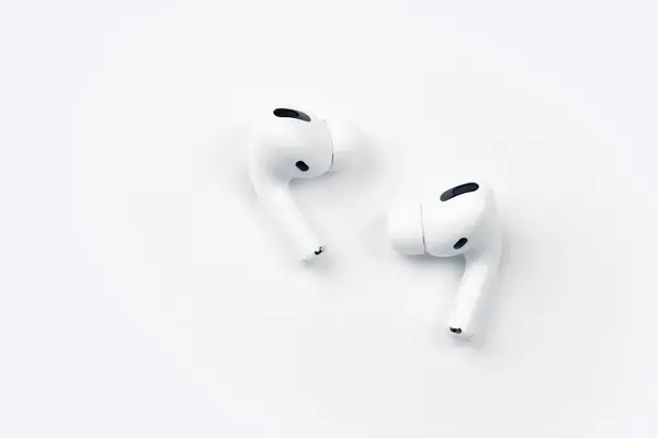 White airpods on a white background