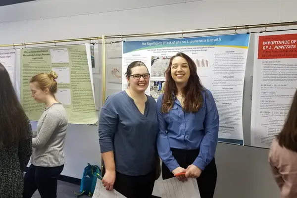 Sally at a research poster session