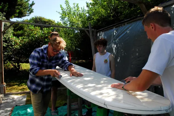 Parker and Mason, Cannon Beach 2020. Working on their first board, “Patient Zero."