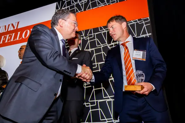 Adam Bean accepting award.